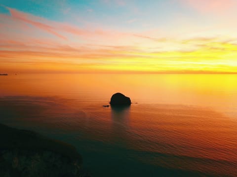 Sunset over Trebarwith | Purlinney, Culvada, Meadwell - Trebarwith Farm Cottages, Trebarwith, Delabole