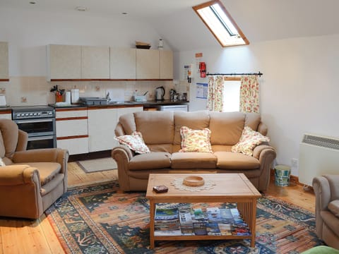 Bright and airy open plan living area with wooden floors | Watermill Cottages - Watermill Cottages, John O’ Groats