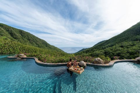 Outdoor pool, pool umbrellas, sun loungers