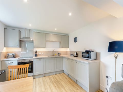 Open plan living space | Cartmel Cottage - Meathop Fell Caravan Club Apartments and Cottage, Meathop, near Grange-over-Sands