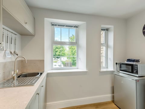 Kitchen | Baycliff Apartment - Meathop Fell Caravan Club Apartments and Cottage, Meathop, near Grange-over-Sands