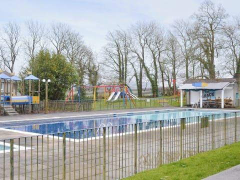 On-site swimming pool and children’s play area | Newquay Holiday Villa, Newquay