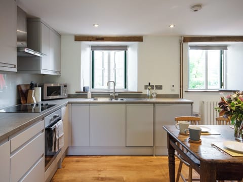 Kitchen with dining area | The Cider Barn at Emmings Farm, Elton, Newnham-on-Severn