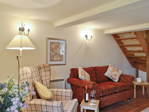 Comfy lounge with access to stairs to upper level | Bramble Cottage - Bramble Cottage and Honey Cottage, Newland, near Coleford