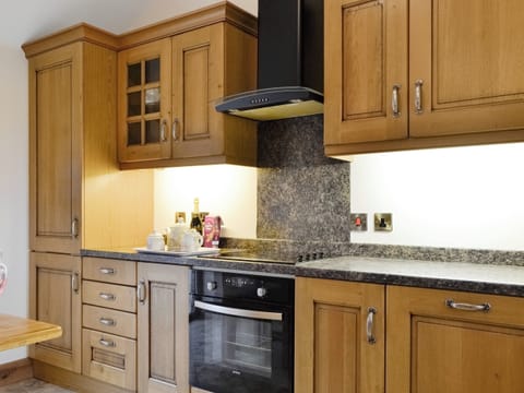 Well-equipped fitted kitchen | The Old Byre - West House Farm, Dearham, near Maryport