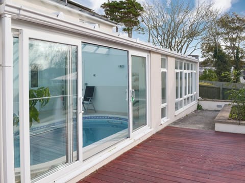 Rear with pool area | Riverside, Bude