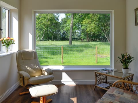 Sitting room with great window view | Bruno’s Bothy, Wigton