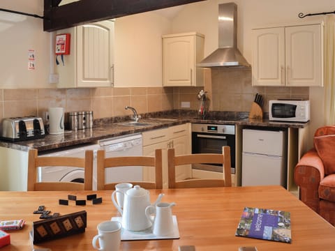 Delightful dining and kitchen areas | Granary - Trimstone Manor Cottages, Trimstone, near Woolacombe