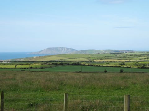 View from garden looking across the fields to Bardsey Island near Aberardon | Salfur, Rhiw, near Pwllheli