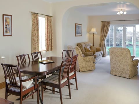 Stylish dining area within living and dining room | Alby Bungalow, Cumwhinton, Carlisle