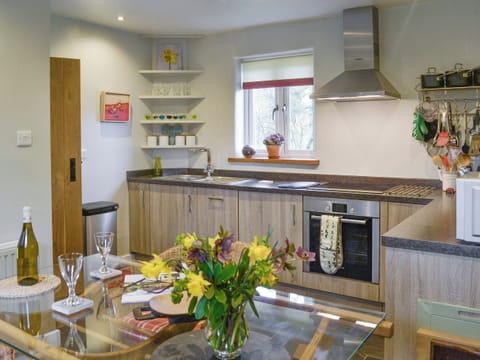 Well-equipped fitted kitchen with convenient dining area | Fisherman’s CottageThe Nook, Dartmeet, near Yelverton