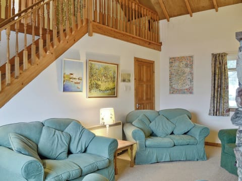 Stairs lead from living area to mezzanine | Tigh na’ Caoiraich, Invergarry, Tomdoun