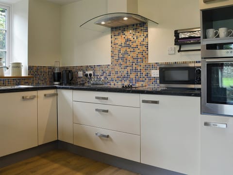 Well equipped kitchen area | Tryfan - The Woollen Mill, Penygroes, near Caernarfon