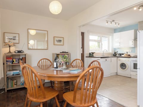 Dining area opening into kitchen | Gorwel Glas, Fishguard, Dyfed