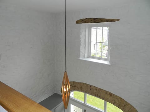 Light and airy stairwell with contemporary lighting | The Tower, Dreenhill, near Haverfordwest