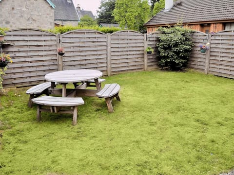 Picnic style seating in the garden | Loramore, Aviemore