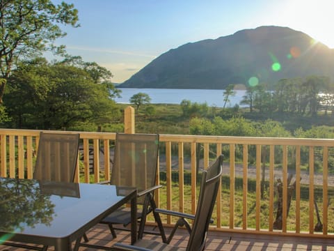 Stunning loch views from the sitting out area | Invernoe Cottage, Taynuilt, near Oban