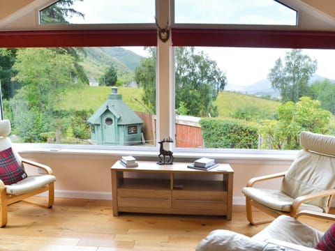 Welcoming sun room overlooking the stunning views | River Mill House, Ballachulish, near Fort William