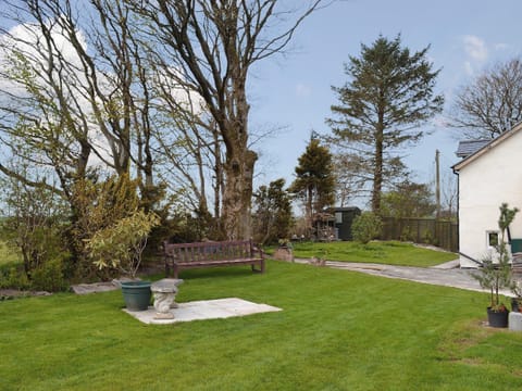 Garden mainly laid to lawn with seating | Bryntrisant, Devil’s Bridge, near Aberystwyth