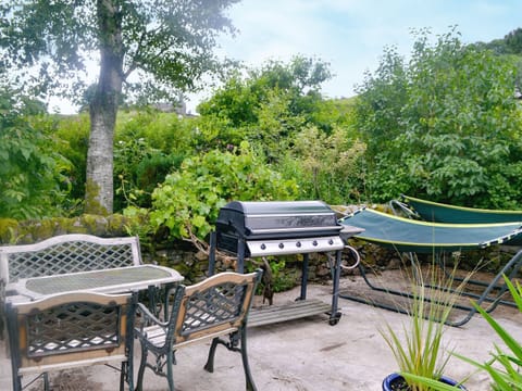Sitting-out area, garden furniture and BBQ | The Cottage, Glenmidge, Auldgirth, near Dumfries