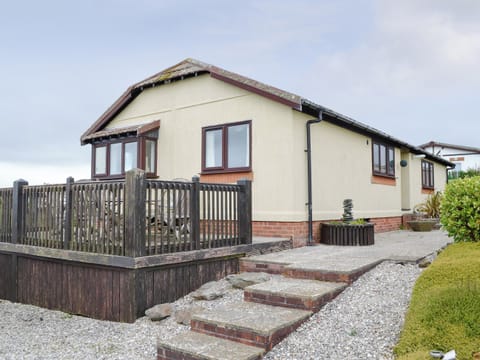Attractive holiday home with raised terrace | Driftwood, St. Merryn, near Padstow