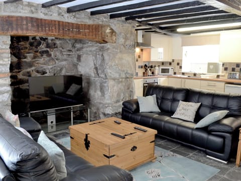 Comfortable living room/ kitchen, beamed ceiling | Pendref, Trawsfynydd, near Blaenau Ffestiniog