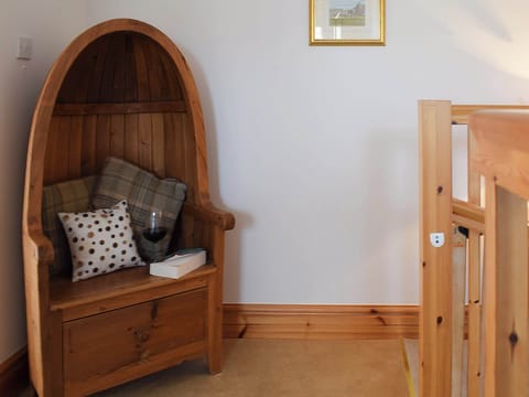 Landing area with cosy chair | The Roundel, Balmullo, near St Andrews
