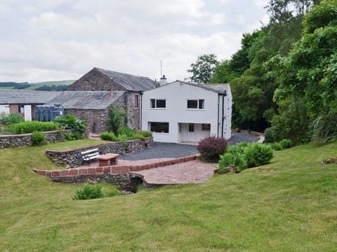 Gardens and property viewed from rear | Bellegrove Cottage, Watermillock, Ullswater