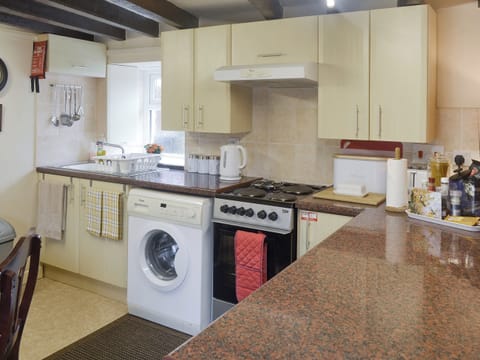 Well-equipped fitted kitchen | The Den - Ty Copr, Pen-y-Sarn, near Amlwch