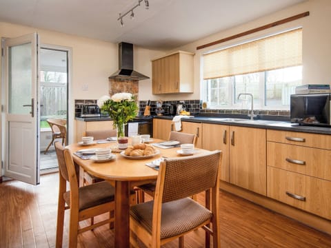 Well-equipped kitchen with dining area | Dunstanburgh View - Proctors Stead Cottages, Dunstan, near Craster