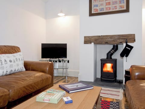 Spacious comfortable living room with wood burning stove | Ty· Cai - Ty Coch Chatham, Llandwrog, near Caernarfon