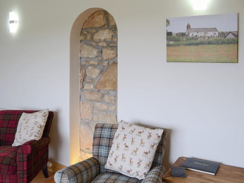 Charming living room with exposed stonework | Sheaf Dale, Portmahomack, near Tain
