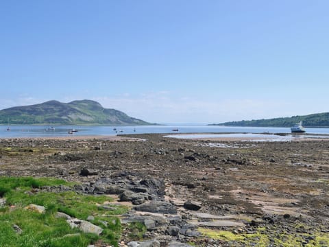 The beach is only 20 yards from the property | Ivybank Cottage, Lamlash, Isle of Arran