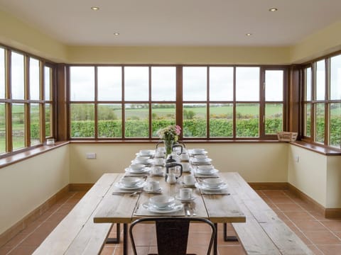 Large dining room | Llofft Storws - Bronallt Barns, Llanynghenedl, near Holyhead