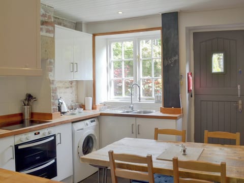 Quaint kitchen/ dining room | Pear Tree Cottage, Wirksworth, near Matlock