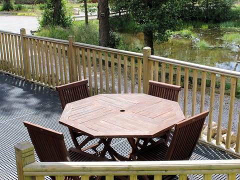 The terrace has a sitting out area, perfect for outdoor entertaining | Rowanburn Lodge, Greystoke, near Penrith