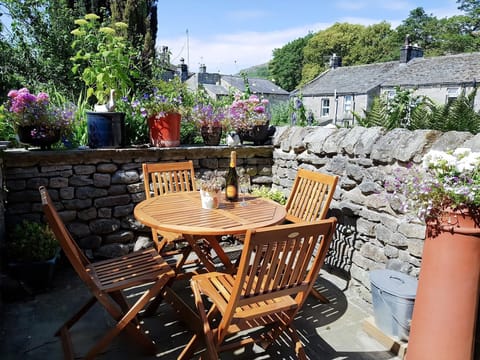 Relaxing sitting-out-area | Poppy Cottage, Hebden, near Grassington