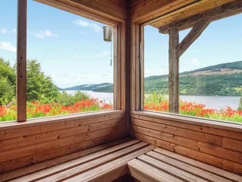 The sauna also has an outside deck to sunbathe whist enjoying the incredible views of the loch and the hills | Chapelburn, Fearnan, near Aberfeldy