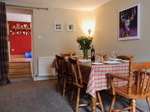 Attractive and warm dining room with open fire | Toad Hall, Aberfeldy