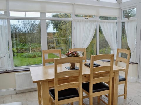 Bright and airy conservatory | Lottie’s Place, Seahouses