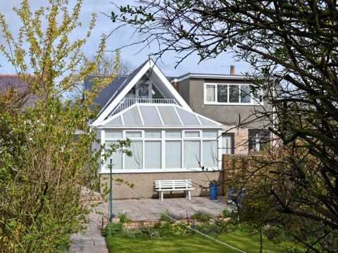 Exterior of the rear with conservatory | Lottie’s Place, Seahouses