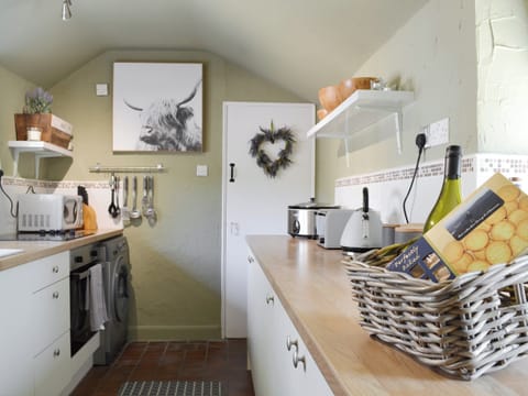 Well-equipped fitted kitchen | Coach House - Grange End Cottages, Grasmere
