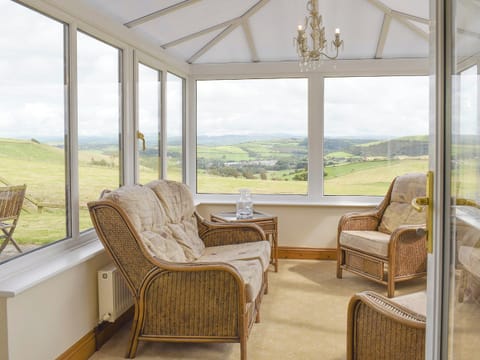 Light and airy conservatory with stunning rural views | No 1 Pengraig Draw - Pengraig Cottages, Near Llanfarian