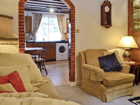 Comfy lounge adjoins kitchen and dining room | Y Bwthyn, Bala