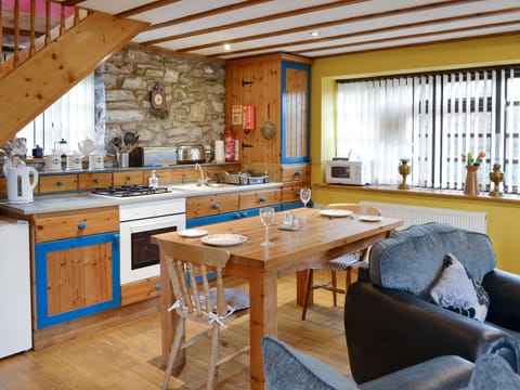 Well-equipped fitted kitchen | The Coach House at Old Vicarage Cottage, Betws-yn-Rhos, near Abergele