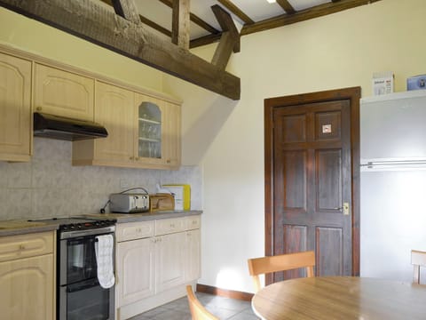 Informal dining area within kitchen | Grove Sprightly Barn, Craven Arms