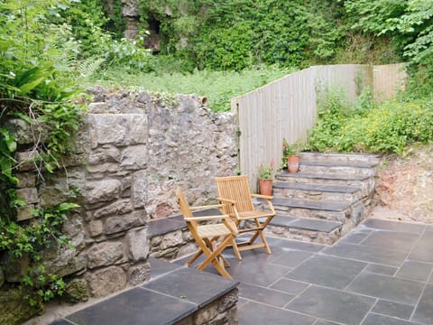 Paved patio area with outdoor furniture | Ty Newydd y Graig, Tremeirchion, near St. Asaph