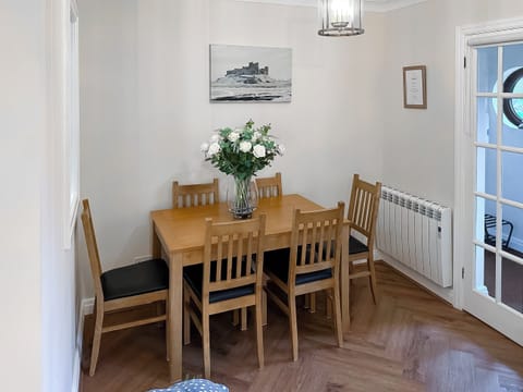 Attractively decorated living and dining area | Cleet’s Retreat, Seahouses