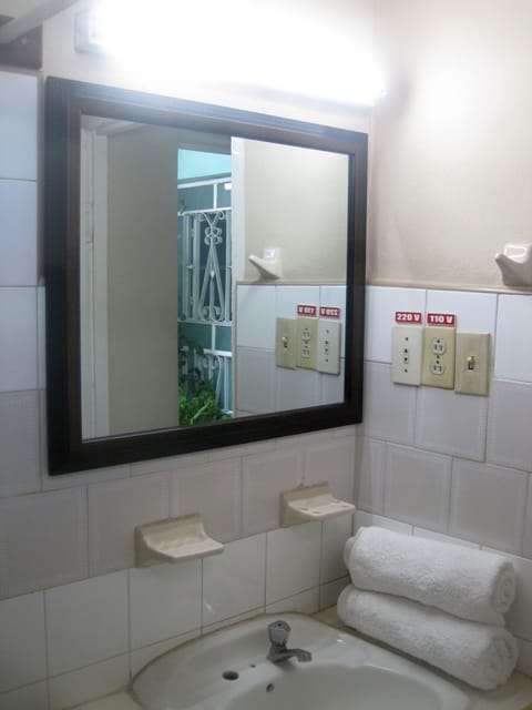 Family Room, City View | Bathroom | Shower, rainfall showerhead, free toiletries, hair dryer