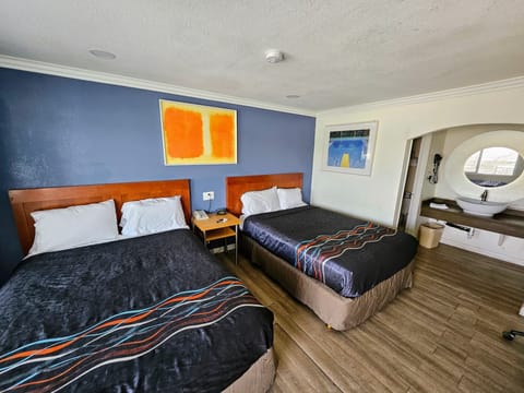 Standard Room, 2 Queen Beds, Non Smoking | 1 bedroom, desk, free WiFi, bed sheets